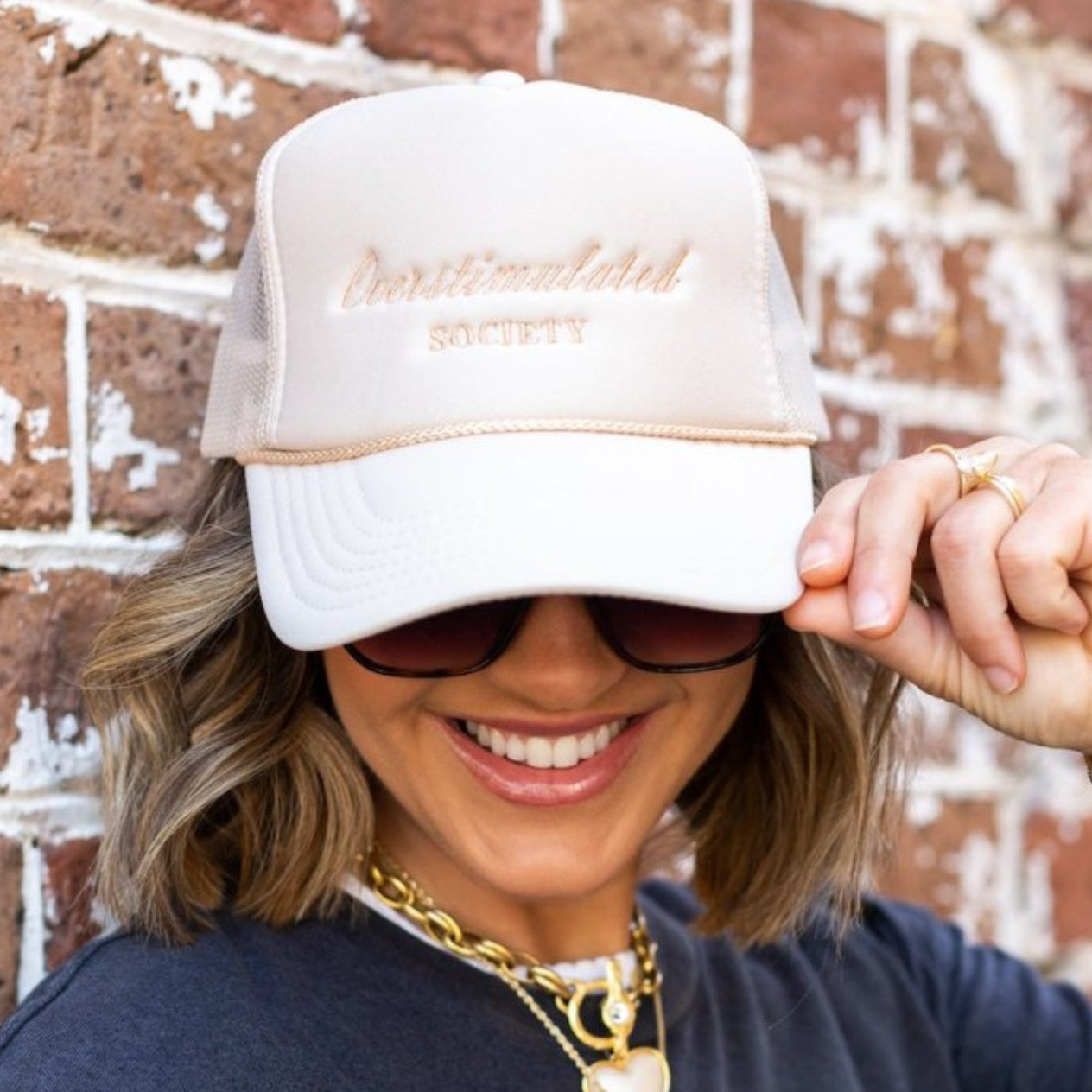 UM X @livinwithMB Overstimulated Society Hat
